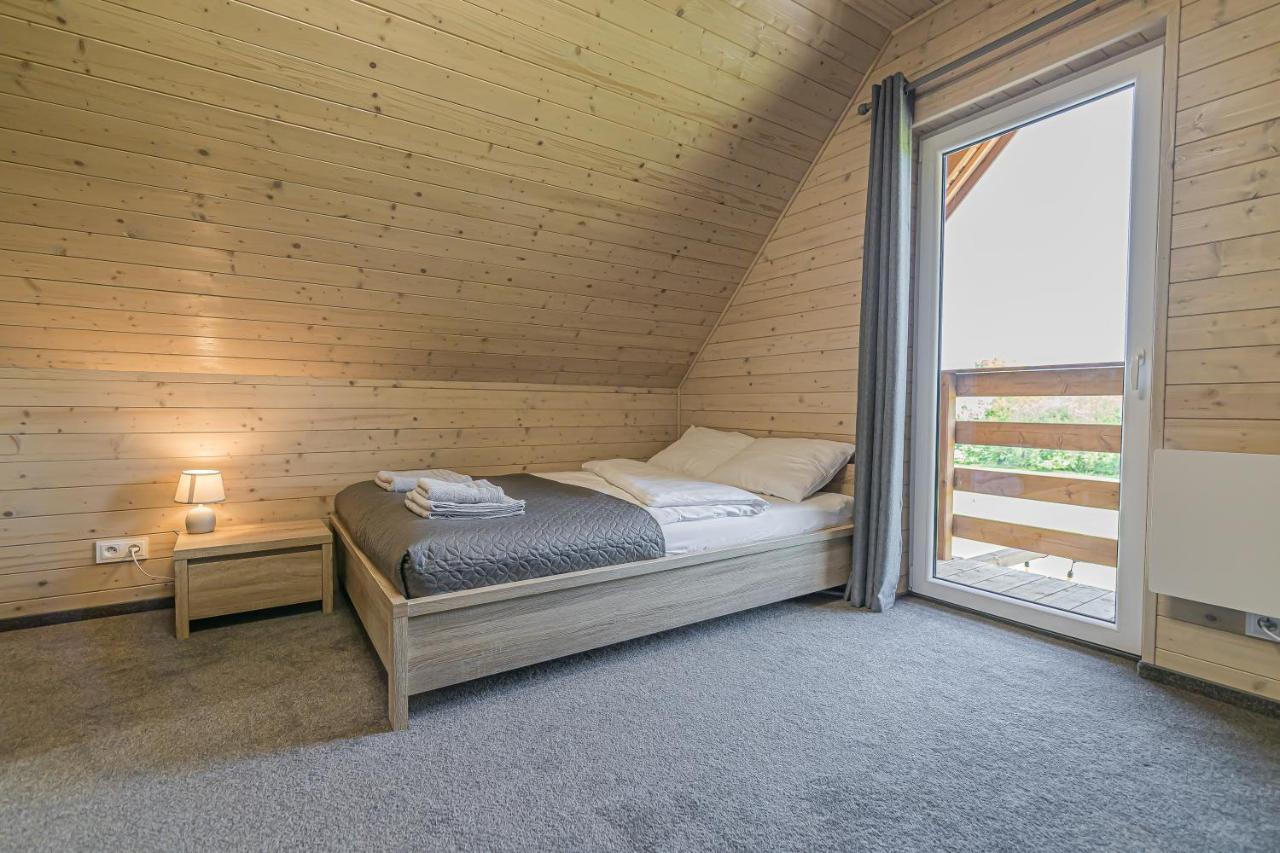 Wycisznia - Drewniane Caloroczne Ferienhaus